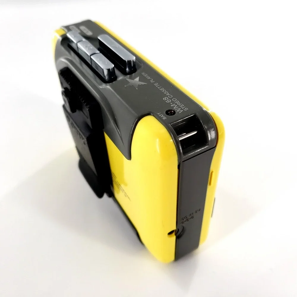 Sony Walkman WM-68 Stereo Cassette Player w/ Clip Yellow Brand New Belts Tested